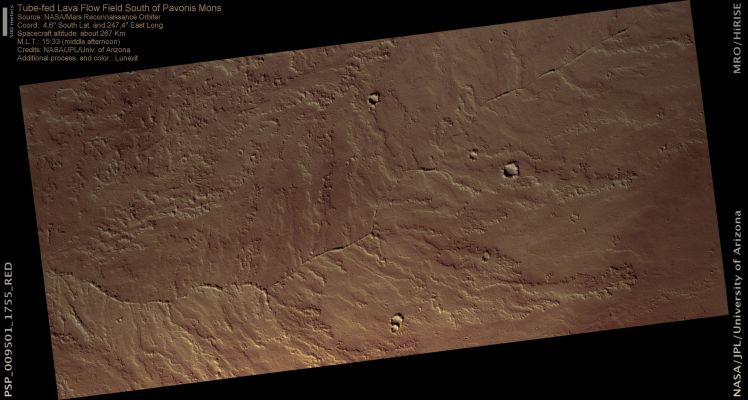Tube-Fed Lava Flow Field (natural colors; credits: Lunexit)
This Lava Flow Field is part of a Small Shield Volcano within the Lava Plains South of Pavonis Mons. It illustrates the importance of Lava Tubes in the formation of large lava flow fields. 

Shield Volcanoes are often covered by a combination of open Lava Channels and partly enclosed Lava Tubes, through which lava once flowed when the volcano was active. Tubes are often located axial to topographic ridges, and after a Lava Flow ends, a tube can drain leaving an empty space into which the roof can collapse.
However, if a tube is filled to capacity or under pressure when the lava is flowing, narrow ridge-like features and/or small Lava Flow breakouts can form. 

This scenario is one possible explanation for the Ridged Lava Flow in the center of this image. 
Here, a narrow wall-like feature is axial to a larger topographic ridge that appears to be the source for a series of smaller Lava Flows.
Parole chiave: Mars from orbit - Lava Flows