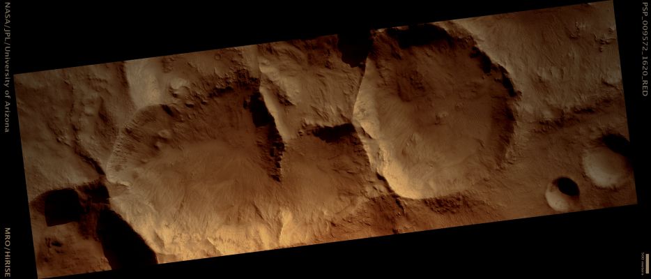 Secondary Craters in Hesperia Planum (Enhanced and Saturated Natural Colors; credits for the additional process. and color.: Dr Paolo C. Fienga - Lunar Explorer Italia)
Mars Local Time: 15:33 (middle afternoon)
Coord. (centered): 17,7° South Lat. and 109,6° East Long.
Spacecraft altitude: 257,5 Km (such as about 160,9 miles) 
Original image scale range: 25,8 cm/pixel (with 1 x 1 binning) so objects ~77 cm across are resolved 
Map projected scale: 25 cm/pixel 
Map projection: EQUIRECTANGULAR 
Emission Angle: 3,8° 
Phase Angle: 63,7°
Solar Incidence Angle: 66° (meaning that the Sun is about 24° above the Local Horizon)
Solar Longitude: 111,1° (Northern Summer)
Credits: NASA/JPL/University of Arizona
Additional process. and coloring: Lunar Explorer Italia

Nota Lunexit: la caption NASA originale titola la foto "Fresh or Well-Preserved Chain of Impact Craters". A nostro avviso, le features di questo frame NON sono rappresentative di Crateri da Impatto Primari bensì - ed al limite - da Crateri da Impatto Secondari (è la loro forma, infatti, alquanto irregolare e squadrata, che ci suggerisce di escludere l'ipotesi per cui si tratti di Primary Impact Craters).
Parole chiave: Mars from orbit - Craters - Unnamed Secondary Craters (or Crater Chaim) in Hesperia Planum