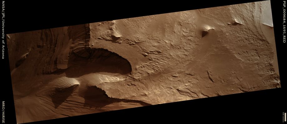 Exposure of Light-Toned Layering along Wallrock in Coprates Chasma (possible True Colors; credits: Lunar Explorer Italia)
Mars Local Time: 15:32 (middle afternoon)
Coord. (centered): 10,2° South Lat. and 290,8° East Long.
Spacecraft altitude: 260,8 Km (such as about 163,0 miles) 
Original image scale range: 26,1 cm/pixel (with 1 x 1 binning) so objects ~78 cm across are resolved 
Map projected scale: 25 cm/pixel 
Map projection: EQUIRECTANGULAR 
Emission Angle: 2,5° 
Phase Angle: 59,7°
Solar Incidence Angle: 62° (meaning that the Sun is about 28° above the Local Horizon)
Solar Longitude: 115,1° (Northern Summer)
Credits: NASA/JPL/University of Arizona
Additional process. and coloring: Lunar Explorer Italia
Parole chiave: Mars from orbit - Coprates Chasma