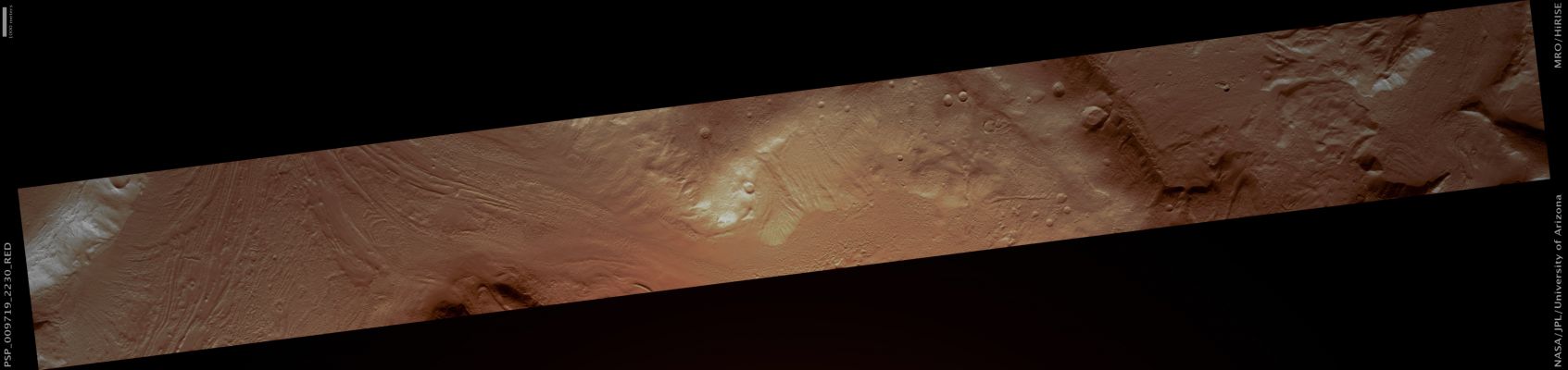 Fretted Terrain in Protonilus Mensae (possible True Colors; credits: Lunar Explorer Italia)
Caption NASA:"This observation shows Fretted Terrain in valleys located in Protonilus Mensae near the so-called "Crustal Dichotomy", such as the Region that separates the Southern Hemisphere Highlands from the Northern Hemisphere Lowlands.

Fretted Terrain is thought to involve movement of ice-rich material in its formation. The speckled texture of the valley fill (i.e. the Fretted Terrain) is probably due to sublimation, when ice goes directly from a solid to a gas, leaving behind empty space under the soil into which overlying material can collapse.

The linear striations in the valley fill mark the direction of movement. For example, in the valley near the top of the image (left), the material was moving across the scene. 
Also in this scene, are several small craters in various stages of degradation".

§§§

Mars Local Time: 15:20 (early afternoon)
Coord. (centered): 42,4° North Lat. and 48,1° East Long.
Spacecraft altitude: 295,4 Km (such as about 184,6 miles) 
Original image scale range: 59,1 cm/pixel (with 1 x 1 binning) so objects ~1,77 mt across are resolved 
Map projected scale: 50 cm/pixel
Map projection: EQUIRECTANGULAR 
Emission Angle: 0,4° 
Phase Angle: 46,0°
Solar Incidence Angle: 46° (meaning that the Sun is about 44° above the Local Horizon)
Solar Longitude: 116,4° (Northern Summer)
Credits: NASA/JPL/University of Arizona
Additional process. and coloring: Lunar Explorer Italia
Parole chiave: Mars from orbit - Protonilus Mensae Region