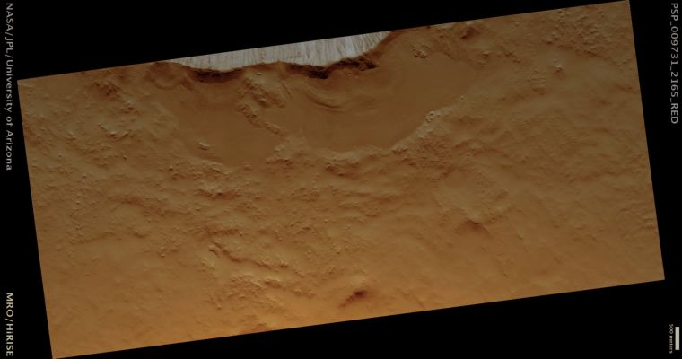 Periglacial Modification of a Fairly Fresh Crater in Utopia Planitia (possible True Colors; credits: Lunar Explorer Italia)
Mars Local Time: 15:19 (early afternoon)
Coord. (centered): 36,0° North Lat. and 80,7° East Long.
Spacecraft altitude: 295,3 Km (such as about 184,6 miles) 
Original image scale range: 29,5 cm/pixel (with 1 x 1 binning) so objects ~89 cm across are resolved 
Map projected scale: 25 cm/pixel 
Map projection: EQUIRECTANGULAR 
Emission Angle: 8,4° 
Phase Angle: 53,4°
Solar Incidence Angle: 45° (meaning that the Sun is about 45° above the Local Horizon)
Solar Longitude: 116,8° (Northern Summer)
Credits: NASA/JPL/University of Arizona
Additional process. and coloring: Lunar Explorer Italia
Parole chiave: Mars from orbit - Utopia Planitia