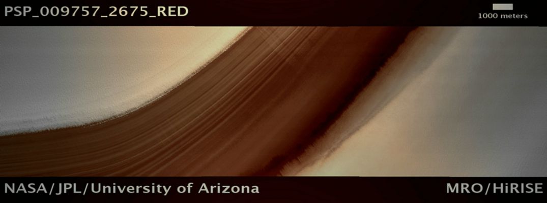 High-Latitude Exposure of North Polar Layered Deposits (possible True Colors; credits: Lunar Explorer Italia)
Mars Local Time: 14:41 (early afternoon)
Coord. (centered): 87,3° North Lat. and 77,4° East Long.
Spacecraft altitude: 342,6 Km (such as about 214,1 miles) 
Original image scale range: 68,5 cm/pixel (with 1 x 1 binning) so objects ~2,06 mt across are resolved 
Map projected scale: 50 cm/pixel 
Map projection: EQUIRECTANGULAR 
Emission Angle: 23,8° 
Phase Angle: 47,9°
Solar Incidence Angle: 66° (meaning that the Sun is about 24° above the Local Horizon)
Solar Longitude: 117,8° (Northern Summer)
Credits: NASA/JPL/University of Arizona
Additional process. and coloring: Lunar Explorer Italia
Parole chiave: Mars from orbit - North Polar Features - NPLD