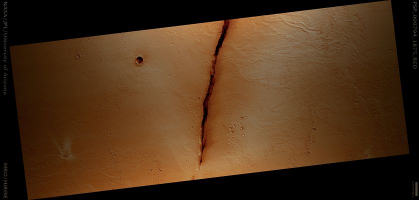 Relatively Fresh (and Rayed) Crater, Windstreaks and Fissure in Cerberus Fossae (Saturated Natural Colors; credits for the additional process. and color.: Dr Paolo C. Fienga - Lunar Explorer Italia)
Mars Local Time: 15:29 (early afternoon)
Coord. (centered): 7,4° North Lat. and 165,3° East Long.
Spacecraft altitude: 274,7 Km (such as about 171,7 miles) 
Original image scale range: 27,5 cm/pixel (with 1 x 1 binning) so objects ~82 cm across are resolved 
Map projected scale: 25 cm/pixel 
Map projection: EQUIRECTANGULAR 
Emission Angle: 0,1° 
Phase Angle: 52,4°
Solar Incidence Angle: 52° (meaning that the Sun is about 38° above the Local Horizon)
Solar Longitude: 119,1° (Northern Summer)
Credits: NASA/JPL/University of Arizona
Additional process. and coloring: Lunar Explorer Italia
Parole chiave: Mars from orbit - Cerberus Fossae Region