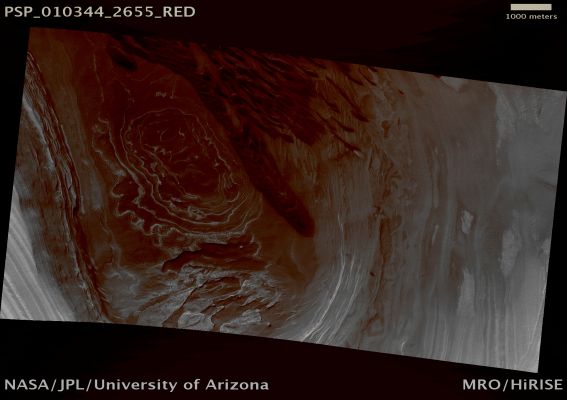 Scarp-Fed Dark Dunes (possible True Colors; credits: Lunar Explorer Italia)
Mars Local Time: 09:59 (middle morning hours)
Coord. (centered): 85,7° South Lat. and 179,4° East Long.
Spacecraft altitude: 330,6 Km (such as about 206,6 miles) 
Original image scale range: 66,1 cm/pixel (with 1 x 1 binning) so objects ~1,98 mt across are resolved 
Map projected scale: 50 cm/pixel
Map projection: EQUIRECTANGULAR 
Emission Angle: 17,4° 
Phase Angle: 84,6°
Solar Incidence Angle: 70° (meaning that the Sun is about 20° above the Local Horizon)
Solar Longitude: 139,7° (Northern Summer)
Credits: NASA/JPL/University of Arizona
Additional process. and coloring: Lunar Explorer Italia
Parole chiave: Mars from orbit - North Polar Features - Dunes