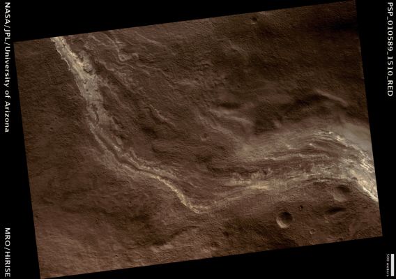 Layered Deposits North of Hellas Basin (Natural Colors; credits: Lunar Explorer Italia)
Mars Local Time: 15:47 (middle afternoon)
Coord. (centered): 28,7° South Lat. and 65,5° East Long.
Spacecraft altitude: 258,4 Km (such as about 161,5 miles) 
Original image scale range: 51,7 cm/pixel (with 1 x 1 binning) so objects ~1,55 mt across are resolved 
Map projected scale: 50 cm/pixel
Map projection: EQUIRECTANGULAR 
Emission Angle: 0,3° 
Phase Angle: 68,8°
Solar Incidence Angle: 69° (meaning that the Sun is about 21° above the Local Horizon)
Solar Longitude: 149,3° (Northern Summer)
Credits: NASA/JPL/University of Arizona
Additional process. and coloring: Lunar Explorer Italia
Parole chiave: Mars from orbit - Hellas Basin