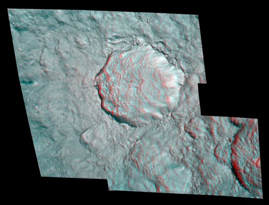 Rayed Crater on Rhea (3D)
Rhea's surface gains some depth in this stereo image, or anaglyph, which features the bright and geologically young-looking rayed crater on the moon's Leading Hemisphere. The view was created from images taken during Cassini's close encounter with Rhea on Aug. 30, 2007. 
The crater is about 48 Km (approx. 30 miles) wide, and its rays extend several hundred kilometers outward. The rim of this crater is quite sharply defined, and there are few small craters overprinted onto it. These characteristics, along with the brightness of the crater and its rays are indicative of a feature formed relatively recently in geologic history. 
The hummocky floor of the crater possesses a central peak and clusters of small craters. The little craters may be secondary impact sites, formed by ejecta from the primary impact that landed in the crater, or they could have been formed by material that had broken off of the body that struck Rhea.

This stereo image is a mosaic consisting of seven Cassini spacecraft narrow-angle camera images. The view is an orthographic projection centered on 12° South Latitude, 112° West Longitude and has a resolution of 45 meters (148 feet) per pixel. An orthographic view is most like the view seen by a distant observer looking through a telescope. North is up. 

The clear filter images for this stereo image were taken from distances ranging from about 17.000 Km (approx. 10.600 miles, for the red-colored image) to 7.500 Km (such as about 4.700 miles, for the blue/green-colored image) from Rhea.
Parole chiave: Saturn's Moons - Rhea