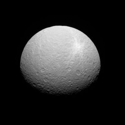 Southern View of Rhea
Caption NASA:"Rhea's bright ray crater features prominently in this southern view. The feature is surrounded by bright ejecta — material thrown outward by the impact that formed the crater. 
The view looks toward High Southern Latitudes on Rhea from a perspective 49 degrees below the icy moon's Equator. Rhea's South Pole is at bottom center. 

The image was taken in visible green light with the Cassini Spacecraft narrow-angle camera on July 29, 2008. The view was acquired at a distance of approx. 413,000 Km (such as about 257.000 miles) from Rhea and at a Sun-Rhea-Spacecraft, or Phase, Angle of 44°. 
Image scale is roughly 2 Km (a little more than 1 mile) per pixel".
Parole chiave: Saturn's Moon - Rhea