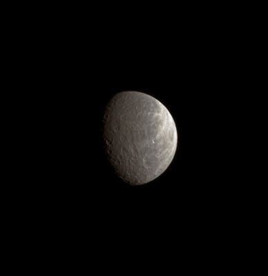 Rhea (Natural Colors; credits: Lunar Explorer Italia)
Caption NASA:"A wide crater dominates the lower right of this image while part of Rhea's brightly lit, wispy terrain can still be seen near the limb of the moon. 
Smaller craters are overprinted upon this crater, telling the story of an extremely old feature that has collected impacts over the eons. Younger craters also have been collected on another of Rhea's large basins — Tirawa (see also PIA08976). 

North on Rhea (approx. 1528 Km, or about 949 miles across) is up. This view looks toward the Saturn facing-Side of Rhea. The image was taken in visible light with the Cassini Spacecraft narrow-angle camera on Aug. 27, 2008. The view was acquired at a distance of approx. 1,1 MKM (such as about 680,000 miles) from Rhea and at a Sun-Rhea-Spacecraft, or Phase, Angle of 56°. 
Image scale is roughly 6 Km (about 4 miles) per pixel".
Parole chiave: Saturn's Moons - Rhea