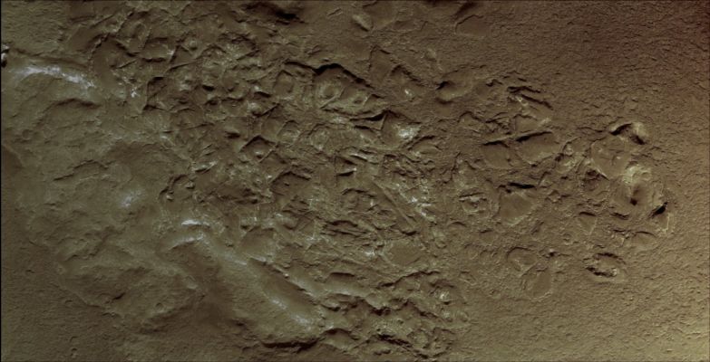 Ridges (Natural Colors; credits for the additional process. and color.: Dr Paolo C. Fienga - Lunexit Team)
Caption NASA:"The Ridges on the Floor of this Unnamed Crater are made of a more resistant material that their surroundings and therefore the erosional processes are first removing the less resistant material".

Coord.: 19,4° South Lat. and 66,3° East Long.
Parole chiave: Mars from orbit - Ridges