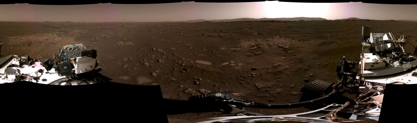 Sol 1 - Panorama
Caption NASA:"This panorama, taken on Feb. 20, 2021, by the Navigation Cameras, or NavCams, aboard NASA’s Perseverance Mars Rover, was stitched together from six individual images after they were sent back to Earth. 
A key objective for Perseverance’s Mission on Mars is Astrobiology, including the search for signs of ancient microbial life. 
The Rover will characterize the planet’s geology and past climate, pave the way for human exploration of the Red Planet, and be the first mission to collect and cache Martian rock and regolith.
Subsequent missions, currently under consideration by NASA in cooperation with ESA (European Space Agency), would send spacecraft to Mars to collect these cached samples from the surface and return them to Earth for in-depth analysis.
The Mars 2020 Perseverance mission is part of NASA’s Moon to Mars exploration approach, which includes Artemis missions to the Moon that will help prepare for human exploration of the Red Planet".
Parole chiave: Martian Panorama, Sun and Sky