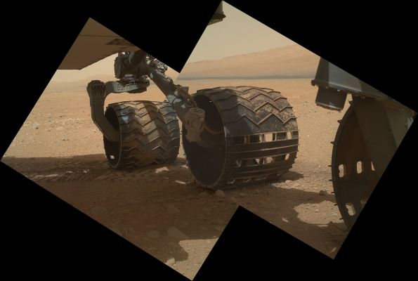 Wheels... - Sol 34 (Natural Colors; credits: NASA/JPL-Caltech/Malin Space Science Systems)
Caption NASA:"This view of the 3 (three) Left Wheels of NASA's Mars Rover Curiosity combines two images that were taken by the Rover's Mars Hand Lens Imager (MAHLI) during the 34th Martian Day, or Sol, of Curiosity's work on Mars (such as September 9, 2012). In the distance is the lower Slope of Mount Sharp. The camera is located in the turret of tools at the end of Curiosity's Robotic Arm. The Sol 34 imaging by MAHLI was part of a week-long set of activities for characterizing the movement of the Arm in the Mars (Environmental) conditions. 
The main purpose of Curiosity's MAHLI camera is to acquire close-up, high-resolution views of Rocks and Soil at the Rover's Gale Crater Field Site. The camera is capable of focusing on any target at distances of about 0,8" (inch), such as 2,1 centimeters, to infinity, providing versatility for other uses, such as views of the Rover itself from different angles".

Nota Lunexit: si poteva fare decisamente di meglio...
Parole chiave: Spacecrafts - MER Curiosity - Wheels and Surface