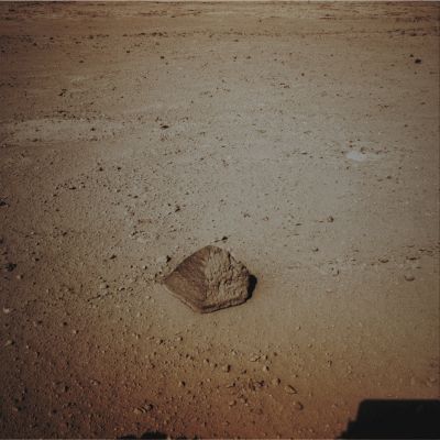 'Jake Matijevic' - Sol 43 (Absolute Natural Colors; credits for the additional process. and color.: Dr Paolo C. Fienga/Lunar Explorer Italia/Italian Planetary Foundation)
Caption NASA:"The drive by NASA's Mars Exploration Rover Curiosity during the Mission's 43rd Martian Day, or Sol, (such as September 19, 2012) ended with this Rock that lies at about 8 feet (such as 2,5 meters) from the Rover. The Rock is about 10" (inches, such as approx. 25 centimeters) tall and 16" (approx. 40 centimeters) wide. The Rover Team has assessed it as a suitable target for the first use of Curiosity's Contact Instruments on a Rock. The image was taken by the left Navigation Camera (or NavCam) at the end of the drive.
The rock has been named "Jake Matijevic", and this choice was made with the aim of commemorating Jacob Matijevic (1947-2012), who was the Surface Operations Systems Chief Engineer for the Mars Science Laboratory Project and the Project's Curiosity Rover. He was also a Leading Engineer for all of the previous NASA Mars Rovers, such as Sojourner, Spirit and Opportunity.
Curiosity's Contact Instruments are on a turret at the end of the Rover's Robotic Arm; they are the Alpha Particle X-Ray Spectrometer (for reading the target's elemental composition) and the Mars Hand Lens Imager (for close-up imaging).
Parole chiave: Martian Surface - Rocks - 'Jake Matijevic' 