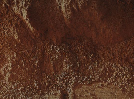 High-Resolution View of a Cross-Section through a Martian Ripple - Sol 58 (Absolute Natural Colors; credits for the additional process. and color.: Dr Paolo C. Fienga - Lunar Explorer Italia - Italian Planetary Foundation)
Caption NASA:"This image shows the wall of a "scuffmark" made by the NASA - MER Curiosity in a Windblown Ripple of Martian Sand, by using one of its wheels. The upper half of the image shows a small portion of the side wall of the scuff and a little bit of the floor of the scuff (bottom of this image). The prominent depression with raised rims at the bottom center of the image was formed by one of the treads on Curiosity's front right wheel.
The largest Grains of Sand in this image are about 0,04 to 0,08" (such as about 1 to 2 millimeters) in size. Those large Grains were on top of the Windblown Ripple and fell down to this location when the scuff was made. The bulk of the Sand in the Ripple is smaller, in the range below 0,002 to 0,008" (i.e.: 50 to 200 microns). The full scuffmark is about 20" (such as approx. 50 centimeters) wide which is, by the way, the same width of Curiosity's wheel. 

This image from the Mars Hand Lens Imager (MAHLI) is the product of merging 8 (eight) images acquired at 8 (eight) slightly different focus settings to bring out details on the wall, slopes, and floor of the wheel scuff. The merge was performed onboard the MAHLI instrument to reduce downlinked data volume.
The image was acquired by MAHLI with the lens about 4,7" (approx. 12 centimeters) from the target. The pixel scale is about 0,002" (such as approx. 50 microns) per pixel. The image covers an area, roughly 3 by 2" (such as about 8 by 6 centimeters). The image was obtained on October, 4, 2012 - such as the 58th Sol, or Martian Day, of operations of the MER Curiosity on the Surface of Gale Crater".
Parole chiave: Martian SUrface - Sand, Dust and Pebbles