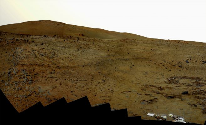 Southern Half of Spirit's 'Bonestell' Panorama - Sol 1599 (natural colors; credits: Lunexit)
This 180-degree panorama shows the southward vista from the location where Spirit is spending its third Martian winter inside Mars' Gusev Crater. The rover's overwintering location is on the northern edge of a low plateau informally called "Home Plate," which is about 80 meters or 260 feet in diameter. 

This view combines 168 different exposures taken with Spirit's panoramic Camera (Pancam)—42 pointings with 4 filters at each pointing. Spirit took the first of these frames during the mission's 1,477th Martian day, or sol, (February 28, 2008) two weeks after the rover made its last move to reach the location where it would stop driving for the winter. Solar energy at Gusev Crater is so limited during the Martian winter that Spirit does not generate enough electricity to drive, nor even enough to take many images per day. The last frame for this mosaic was taken on Sol 1599 (July 2, 2008). The rover team plans for Spirit to finish taking images for the northern half of the scene during the Martian spring. 

The northwestern edge of Home Plate is visible in the right foreground. The blockier, more sharply shadowed texture there is layered sandstone whose layering is tilted inward toward the edge of the Home Plate platform. A dark rock on top of Home Plate in that area is a porous volcanic basalt unlike rocks nearby. The northeastern edge of Home Plate is visible in the left foreground. Spirit first climbed onto Home Plate on that region, in early 2006. 

Rover tracks from driving by Spirit are visible on Home plate in the center and right of the image. These were made during Spirit's second exploration on top of the plateau, which began when Spirit climbed onto the southern edge of Home Plate in September, 2007. 


Parole chiave: Mars Panorama - Gusev Crater