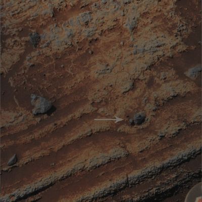 Evidence of Volcanic Explosion? - Sol 748 (Enhanced Absolute Natural Colors; credits for the additional process. and color.: Dr Paolo C. Fienga - Lunexit Team)
Caption NASA originale:"The lower coarse-grained unit shows granular textures toward the bottom of the image and massive textures. Also shown (by the arrow) is a feature interpreted to be a "Bomb Sag" which is about 4 cm across".  

Nota Lunexit: "Bomb Sag"---> (Geology) depressed and deranged Laminae mainly found in beds of fine-grained Ash or Tuff around an included Volcanic Bomb or Block which fell on and became buried in the deposit.
Parole chiave: Martian Surface - Bomb Sag