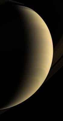 Crescent Saturn
Caption NASA:"Cassini coasts beneath giant Saturn, staring upward at its gleaming crescent and icy rings. 
A great bull's-eye pattern is centered on the South Pole, where a vast, hurricane-like storm spins. 
This view looks toward the lit side of the Rings from about 26° below the Ring-Plane. The view was acquired about 2 hours prior to "The Lore of Saturn". 

Images taken using red, green and blue spectral filters were combined to create this natural-color view. 
The images were obtained with the Cassini spacecraft wide-angle camera on Jan. 30, 2007, from a distance of approx. 1,1 MKM (about 700.000 miles) from Saturn. 
Image scale is roughly 61 Km (about 38 miles) per pixel".
Parole chiave: Saturn