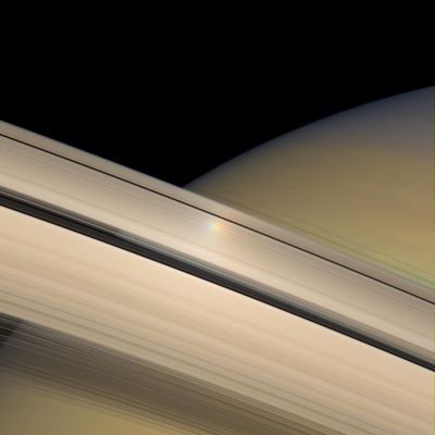 The "Opposition Effect" (again)
The Opposition Effect, a brightness surge that is visible on Saturn's Rings when the Sun is directly behind the Spacecraft, is captured here as a colorful halo of light moving across Saturn's Sunlit Rings. The rainbow of color seen here is actually an artifact and a by-product of the spot's movement and the way the color image was produced. Cassini acquires color images by taking sequential exposures using red, green and blue spectral filters, which are then composited together to form a color view. The bright patch traveled across the Rings between exposures taken for this view, creating a series of 3 colorful spots showing its position at 3 separate moments. 
This view looks toward the Sunlit side of the Rings from about 9° below the Ring-Plane. 

The images in this view were acquired with the Cassini spacecraft wide-angle camera on June 12, 2007, at a distance of approx. 523.000 Km (such as about 325.000 miles) from Saturn. 
Image scale is roughly 31 Km (about 19 miles) per pixel. 


Parole chiave: Saturn