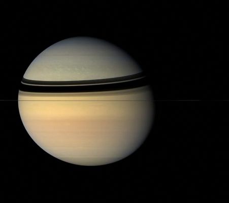 Squashed and Colourful (natural colors; credits: NASA)
Caption NASA:"Saturn in the Cassini era has proved to be an unexpectedly colorful place, compared to the browns and golds imaged by the two Voyager spacecraft. Saturn is headed toward Equinox in 2009, followed by Springtime in the Northern Hemisphere. Having a spacecraft in orbit while such changes occur will be of great benefit in scientists' quest to understand the atmospheres of the Giant Planets. 
The Planet's oblate, or squashed, shape is clearly visible in this view. 
The low-density Planet rotates so fast (in about 10,5 hours) that it flattens out slightly around its middle. The bluish tint of the Northern Latitudes is presumed to be a seasonal effect and will likely disappear entirely as the North receives increasingly greater amounts of sunlight. 
Images taken using red, green and blue spectral filters were combined to create this natural color view. 
The images were obtained with the Cassini spacecraft wide-angle camera on July 29, 2007 at a distance of approx. 3,1 MKM (about 2 MMs) from Saturn"
Parole chiave: Saturn