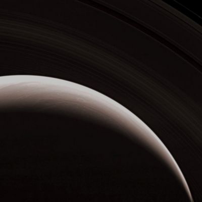 Crescent Saturn (Natural Colors; credits: NASA/JPL/Space Science Institute)
From Norther than the North Pole...  
Caption NASA originale:"The Cassini spacecraft gazes down at the marvelous Rings and swirling clouds of giant Saturn from above the Planet's North Pole. 
Such views are possible as the spacecraft performs its "180°-transfer," a key navigation maneuver that quickly raises the inclination of Cassini's orbit and shifts the orbital ellipse around to a different side of the Planet, before quickly lowering the inclination again. 

The image was taken in visible light with the Cassini spacecraft wide-angle camera on Oct. 30, 2006. Cassini was then at a distance of approx. 1,2 MKM (about 700.000 miles) from Saturn and at a Sun-Saturn-spacecraft, or phase, angle of 142°. 
Image scale is roughly 67 Km (about 41 miles) per pixel".
Parole chiave: Saturn