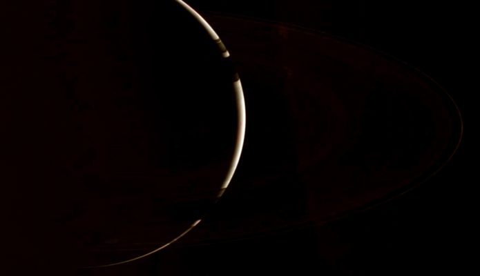 In the Night of Saturn (Natural Colors; credits: NASA/JPL/Space Science Institute)
Caption NASA:"Only Cassini could provide this enchanting, Natural Color view of crescent Saturn, which gazes down onto the unlit side of the Planet's spectacular Rings. The robotic ship plies the peaceful black seas around the Ringed Giant, searching for answers to the many questions posed by the inquisitive minds of Earth. 
This view looks toward the unlit side of the Rings from about 19° above the Ring-Plane. The view of Saturn is through the dark Rings at bottom; the Rings cast shadows onto the Northern Hemisphere at top. Images taken using red, green and blue spectral filters were combined to create this Natural Color view. 

The images were taken with the Cassini Spacecraft wide-angle camera on Nov. 4, 2006 at a distance of approx. 1,7 MKM (a little more than 1 MMs) from Saturn and at a Sun-Saturn-Spacecraft, or Phase, Angle of 162°. Image scale is roughly 97 Km (about 61 miles) per pixel". 
Parole chiave: Saturn