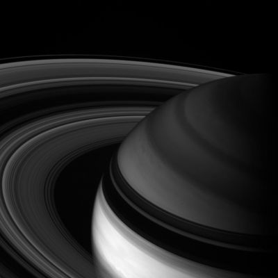 IR Saturn
Caption NASA:"Cassini looks toward Northern Latitudes on Saturn and out across the Ring-Plane. 
This InfraRed (IR) view probes clouds beneath the hazes that obscure the Planet's depths in natural color views. 
This image looks toward the unilluminated side of the Rings from about 24° above the Ring-Plane. The Rings' shadow drapes across the region North of the Planet's bright Equatorial Band. 

The image was taken with the Cassini spacecraft wide-angle camera using a spectral filter sensitive to wavelengths of light centered at 890 nanometers. The view was acquired on May 24, 2007 at a distance of approx. 1,5 MKM (such as about 1 MMs) from Saturn. 
Image scale is roughly 89 Km (55 miles) per pixel".
Parole chiave: Saturn