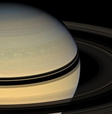Northern Latitudes (approx. true colors; credits: NASA)
Caption NASA:"Stately Saturn sits surrounded by its darkened disk of ice. An increasing range of hues has become visible in the Northern Hemisphere as Spring approaches and the Ring shadows slide southward. 
This view looks toward the unilluminated side of the rings from about 17° above the Ring-Plane. Images taken using red, green and blue spectral filters were combined to create this natural color view. The images were acquired with the Cassini Spacecraft wide-angle camera on April 15, 2008 at a distance of approx. 1,5 MKM (such as about 906.000 miles) from Saturn. 
Image scale is roughly 84 Km (about 52 miles) per pixel".
Parole chiave: Saturn