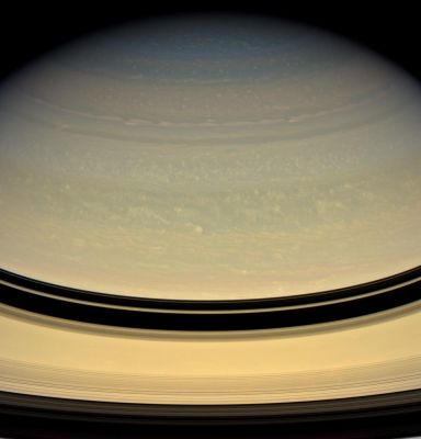 The "Head" of Saturn (Natural Colors; credits: NASA/Space Science Institute)
Caption NASA:"Bright puffs and ribbons of cloud drift lazily through Saturn's murky skies. In contrast to the bold red, orange and white clouds of Jupiter, Saturn's clouds are overlain by a thick layer of haze. The visible cloud tops on Saturn are deeper in its atmosphere due to the Planet's cooler temperatures. 

This view looks toward the unilluminated side of the Rings from about 18° above the Ring-Plane. Images taken using red, green and blue spectral filters were combined to create this natural color view. The images were acquired with the Cassini spacecraft wide-angle camera on April 15, 2008 at a distance of approx. 1,5 MKM (such as about 906,000 miles) from Saturn. 
Image scale is roughly 84 Km (about 52 miles) per pixel".
Parole chiave: Saturn