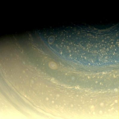 The Blue Pole of Saturn (natural colors; credits: NASA/JPL/Space Science Institute and Lunar Explorer Italia)
Caption NASA:"Saturn's North Pole is littered with storms, as we see in this color view of it. A bit of the North Polar Hexagon is also visible at the upper-right. Cassini scientists are looking forward to sunrise on this Pole next year so that they can better study it in Visible Light. 

Images taken using red, green and blue spectral filters were combined to create this full color view. The images were obtained with the Cassini Spacecraft wide-angle camera on Nov. 16, 2008 at a distance of approx. 673.000 Km (such as about 418.000 miles) from Saturn and at a Sun-Saturn-Spacecraft, or Phase, Angle of 71°. 
Image scale is roughly 37 Km (about 23 miles) per pixel".
Parole chiave: Saturn - Upper Atmosphere