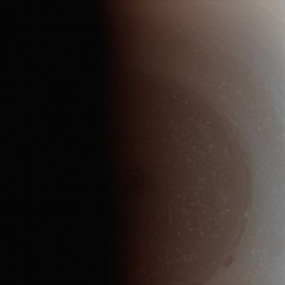 Saturnian Terminator (Natural Colors; credits: Lunar Explorer Italia)
Caption NASA:"The Terminator nearly covers the South Pole of Saturn and its stormy vortex in darkness. 
As the Southern Hemisphere moves toward Winter in the Planet's 29-year orbit, darkness eventually will consume the vortex. But this seasonal change also will bring the North Pole into the light. 

This view looks toward the sunlit side of the Rings from about 69° below the Ring-Plane. 
The image was taken with the Cassini Spacecraft wide-angle camera on Jan. 6, 2009 using a spectral filter sensitive to wavelengths of near-InfraRed Light centered at 752 nanometers. The view was acquired at a distance of approx. 761.000 Km (about 473.000 miles) from Saturn and at a Phase Angle of 96°. 
Image scale is roughly 42 Km (approx. 26 miles) per pixel.
Parole chiave: Saturn - South Pole