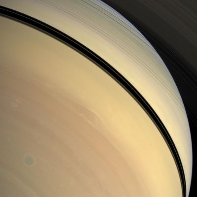 Just like an Iris... (Natural Colors; credits: NASA/JPL/Space Science Institute
Caption NASA:"Rendered in myriad hues, vivid details of Saturn's stormy Atmosphere play out below the shadow of the Rings. A well defined storm swirls through the atmosphere of the southern hemisphere in the lower left of the image, like the tight blue circle of an eye's iris. 

This view looks toward the sunlit side of the Rings from about 36° below the Ring-Plane. 
Images taken using red, green and blue spectral filters were combined to create this Natural Color view. The images were obtained with the Cassini Spacecraft wide-angle camera on Dec. 29, 2008 at a distance of approx. 1,1 MKM (such as about 680.000 miles) from Saturn and at a Sun-Saturn-Spacecraft, or Phase, Angle of 51°. 
Image scale is roughly 60 Km (about 37 miles) per pixel".
Parole chiave: Saturn - Southern Hemisphere