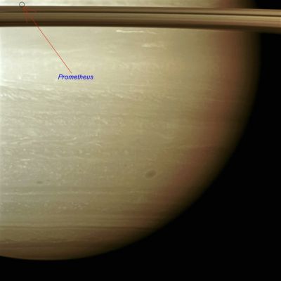 Southern Turbulence (Natural Colors; credits: Lunar Explorer Italia)
Caption NASA:"Through the Atmosphere of the Southern Hemisphere of Saturn rolls a large storm, seen here as a tight dark circle in the lower left of this image. Horizontal strands of other atmospheric formations give the image the fibrous look of travertine stone. 
Prometheus (about 86 Km, or 53 miles across) is a small dark dot in the top left part of the image. 

The image was taken with the Cassini spacecraft wide-angle camera on Dec. 30, 2008 using a combination of polarized and spectral filters sensitive to wavelengths of near-InfraRed Light centered at 752 nanometers. 
The view was acquired at a distance of approx. 1,2 MKM (about 750.000 miles) from Saturn and at a Sun-Saturn-Spacecraft, or Phase, Angle of 27°. 
Image scale is roughly 68 Km (approx. 42 miles) per pixel".
Parole chiave: Saturn - Southern Hemisphere