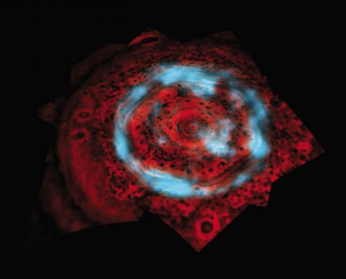 South Polar Aurora on Saturn
Caption NASA:"This image of the North Polar Regions of Saturn shows both the Aurora and underlying Atmosphere, seen at 2 different wavelengths of IR light as captured by NASA's Cassini spacecraft. 
Energetic particles, crashing into the Upper Atmosphere cause the Aurora, shown in blue, to glow brightly at 4 microns (six times the wavelength visible to the human eye). The image shows both a bright ring, as seen from Earth, as well as an example of bright Auroral Emission within the Polar Cap that had been undetected until the advent of Cassini. 

This Aurora, which defies past predictions of what was expected, has been observed to grow even brighter than is shown here. Silhouetted by the glow (cast here to the color red) of the hot interior of Saturn (clearly seen at a wavelength of 5 microns, or seven times the wavelength visible to the human eye) are the clouds and haze that underlie this Auroral Region. For a similar view of the Region beneath the Aurora see PIA09185.
This image is a composite captured with Cassini's Visual and Infrared Mapping Spectrometer. The aurora image was taken in the near-infrared on Nov. 10, 2006, from a distance of about 1 MKM (such as about 659.000 miles), with a phase angle of 157° and a sub-Spacecraft Planetocentric Latitude of 52° North. 

The image of the clouds was obtained by Cassini on June 15, 2008, from a distance of approx. 602.000 Km (such as about 374.000 miles) and a sub-Spacecraft Planetocentric Latitude of 73° North".
Parole chiave: Saturn - Upper Atmosphere - The South Pole