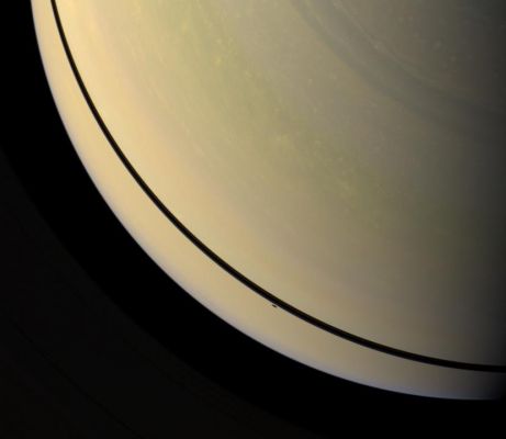 Approaching the Equinox
Caption NASA:"The shadow of the moon Mimas has just slipped off Saturn's Rings and onto the Planet in this Cassini Spacecraft image. The shadow is visible as a short dash below the Rings' shadows on the Planet. At this exposure setting, the Rings are too dim to be seen easily. As Saturn approaches its August 2009 equinox, the Planet's moons cast shadows onto the Rings.

This view looks toward the unilluminated side of the Rings from about 61° above the Ring-Plane. Images taken using red, green and blue spectral filters were combined to create this Natural Color view. The images were obtained with the Cassini Spacecraft wide-angle camera on April 30, 2009 at a distance of approx. 1,4 MKM (about 870.000 miles) from Saturn. 
Image scale is roughly 80 Km (about 50 miles) per pixel".
Parole chiave: Saturn