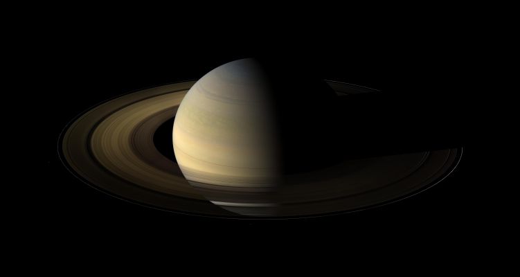 The Lord of the Rings (Natural Colors; credits: NASA/JPL/Space Science Institute)
Caption NASA:"Of the countless Equinoxes Saturn has seen since the birth of the Solar System, this one, captured here in a mosaic of light and dark, is the first witnessed up close by an emissary from Earth … none other than our faithful robotic explorer, Cassini. 

Seen from our planet, the view of Saturn’s Rings during Equinox is extremely foreshortened and limited. But in orbit around Saturn, Cassini had no such problems. From 20° above the Ring-Plane, Cassini’s wide angle camera shot 75 exposures in succession for this mosaic showing Saturn, its Rings, and a few of its moons a day and a half after exact Saturn Equinox, when the Sun’s disk was exactly overhead at the Planet’s Equator. 

The novel illumination geometry that accompanies equinox lowers the Sun’s angle to the Ring-Plane, significantly darkens the Rings and causes out-of-plane structures to look anomalously bright and to cast shadows across the Rings themselves. 
These scenes are possible only during the few months before and after Saturn’s Equinox which occurs only once in about 15 Earth years. 
Before and after Equinox, Cassini’s cameras have spotted not only the predictable shadows of some of Saturn’s moons (see also PIA11657), but also the shadows of newly revealed vertical structures in the Rings (see, for example, PIA11665). 

Also at Equinox, the shadows of the Planet’s expansive Rings are compressed into a single, narrow band cast onto the Planet as seen in this mosaic. (For an earlier view of the Rings’ wide shadows draped high on the Northern Hemisphere, see PIA09793) 

The images comprising the mosaic, taken over about eight hours, were extensively processed before being joined together. First, each was re-projected into the same viewing geometry and then digitally processed to make the image “joints” seamless and to remove lens flares, radially extended bright artifacts resulting from light being scattered within the camera optics. 

At this time so close to Equinox, illumination of the Rings by sunlight reflected off the planet vastly dominates any meager sunlight falling on the Rings. Hence, the half of the Rings on the left illuminated by planetshine is, before processing, much brighter than the half of the Rings on the right. On the right, it is only the vertically extended parts of the Rings that catch any substantial sunlight. 

With no enhancement, the Rings would be essentially invisible in this mosaic. To improve their visibility, the dark (right) half of the Rings has been brightened relative to the brighter (left) half by a factor of three, and then the whole Ring System has been brightened by a factor of 20 relative to the Planet. So the dark half of the rings is 60 times brighter, and the bright half 20 times brighter, than they would have appeared if the entire System, Planet included, could have been captured in a single image. 

The moon Janus (about 179 Km, or approx. 111 miles across) is on the lower left of this image. Epimetheus about (113 Km, or approx. 70 miles across) appears near the middle bottom. Pandora (about 81 Km, or approx. 50 miles across) orbits outside the Rings on the right of the image. The small moon Atlas (about 30 Km, or approx. 19 miles across) orbits inside the thin F-Ring on the right of the image. 

The brightnesses of all the moons, relative to the Planet, have been enhanced between 30 and 60 times to make them more easily visible. Other bright specks are background stars. Spokes -- ghostly radial markings on the B ring -- are visible on the right of the image. 

This view looks toward the northern side of the Rings from about 20° above the Ring-Plane. 

The images were taken on Aug. 12, 2009, beginning about 1,25 days after exact equinox, using the red, green and blue spectral filters of the wide angle camera and were combined to create this Natural Colors view. 
The images were obtained at a distance of approx. 847.000 Km (about 526.000 miles) from Saturn and at a Sun-Saturn-Spacecraft, or Phase, Angle of 74°. 
Image scale is roughly 50 Km (about 31 miles) per pixel".

Nota Lunexit: una interpretazione in Colori Naturali davvero stupenda, per qualità, definizione e realismo. Una prova evidente che i lavori "brutti" (e cioè il 99% dei prodotti fotografici a colori riguardanti Marte) la NASA non li fa perchè "non è capace" (ovviamente), ma solo perchè "non vuole farli com sa fare".
Il motivo? Beh, certo non è "pigrizia" (anche se non si può mai dire)...
Parole chiave: Saturn