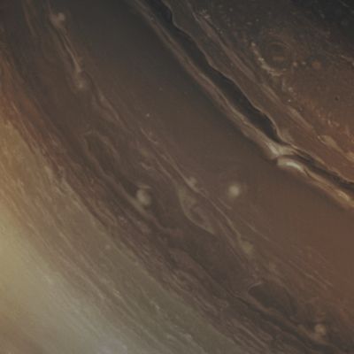 The restless Saturnian Atmosphere (Absolute Natural Colors; credits for the additional process. and color.: Dr Paolo C. Fienga/Lunar Explorer Italia/Italian Planetary Foundation)
The always richly dynamic Atmosphere of Saturn rewards - once again - its observers by showing unique and fascinating (even though just temporary) Cloud Structures and Formations. Here, the NASA - Cassini Spacecraft used the Near-InfraRed filters on its Wide-Angle Camera to get a better look at some of Saturn's Cloud Patterns, which are continuously shaped (and re-shaped, restlessly) by the powerful Winds and Storms that keep blowing and forming, respectively, in the Upper Atmosphere of the ringed Gas-Giant Planet.

The view is centered at 30° North Latitude and 42° West Longitude; North is up and rotated 44° to the right. The image was taken with the NASA - Cassini Spacecraft Wide-Angle Camera on December 24, 2012, using a spectral filter sensitive to wavelengths of Near-InfraRed Light centered at 752 nanometers. The image was acquired at a distance of approximately 440.000 miles (such as about 708.000 Km) from the top of Saturn's Clouds and at a Sun-Saturn-CASSINI Spacecraft, or Phase, Angle of 14°. Image scale is roughly 26 miles (such as 41,84 Km) per pixel. 

This picture (which is an Original NASA - Cassini Spacecraft b/w frame published on the NASA - Planetary Photojournal and identified by the n. PIA 14656) has been additionally processed and then colorized, according to an educated guess carried out by Dr Paolo C. Fienga (LXTT-IPF), in Absolute Natural Colors (such as the colors that a human eye would actually perceive if someone were onboard the NASA - Cassini Spacecraft and then looked outside, towards the Gas-Giant Planet Saturn), by using an original technique created - and, in time, dramatically improved - by the Lunar Explorer Italia Team. Different colors, as well as different shades of the same color, mean, among others, the existence of different Elements present in the Upper Atmosphere of Saturn, each having a different Albedo (---> Reflectivity) and Chemical Composition. 

Note: it is possible (but we, as IPF, have no way to be one-hundred-percent sure of such a circumstance), that the actual luminosity of the Clouds and Hazes (as well as the luminosity of Saturn itself) seen in this frame would appear, to an average human eye, way lower than it has been shown (or, better yet: interpreted) here.
Parole chiave: Saturn - Upper Atmosphere - Cloud Bands