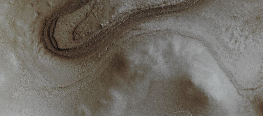 South Polar Layers (Absolute Natural Colors; credits for the additional process. and color.: Dr Paolo C. Fienga - Lunexit Team)
Caption NASA originale:"This MGS-MOC image shows remnants of Layered Materials near the West Rim of a Southern Unnamed Crater. The composition of these layered rocks is unknown — are they the remains of sedimentary rocks or accumulations of dust and ice? We'll probably not know until someone visits this area, perhaps centuries from now". 

Location near: 77,4° South; 341,5° West
Image width: ~3 Km (~1,9 mi) 
Illumination from: upper left 
Season: Southern Summer 
Parole chiave: Mars from orbit - South Polar Features - Layers
