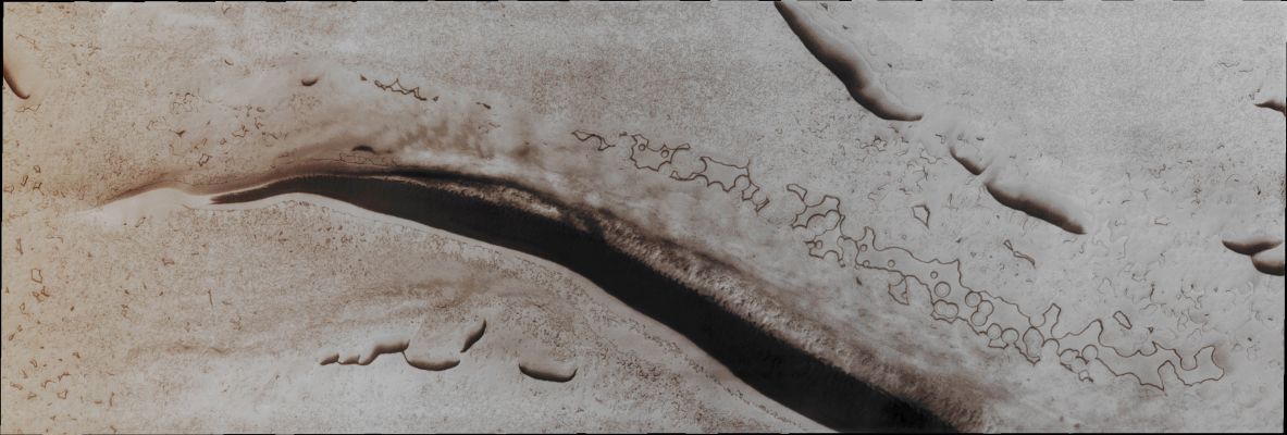 South Polar Features (Absolute Natural Colors; credits for the additional process. and color.: Dr Paolo C. Fienga - Lunexit Team)
Caption NASA:"It is high Summer now at the South Pole of Mars. The circular surface features may look like Swiss Cheese, but how they form, coalesce, and disappear is not yet fully understood".

Orbit Number: 42220 
Latitude: 86,17° South 
Longitude: 289,83° East 
Instrument: VIS 
Captured: June, 21, 2011
Mars Local Time (M.L.T.): 16:01 (Middle Afternoon)


Parole chiave: Mars from orbit - South Polar Features - Trough