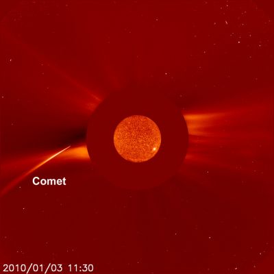 Sungrazer
Caption NASA:"Intense and overwhelming, the direct glare of the Sun is blocked by the smooth occulting disk in this image from the Sun-staring SOHO Spacecraft. Taken on January 3rd, 2010, an extreme UltraViolet image of the Sun to scale, is superimposed at the center of the disk. Beyond the disk's outer boundary, is a Sungrazer Comet, one of the brightest yet seen by SOHO. 
The comet was discovered by an Australian Amateur Astronomer, Alan Watson, while examining earlier images from another Sun-watching Spacecraft, STEREO-A. Based on their orbits, Sungrazers are believed to belong to the Kreutz family of comets, created by successive break ups from a single large Parent Comet that passed very near the Sun in the twelfth century. 
Subjected to strong Tidal Forces and intense Solar Heat, this Sungrazer did not survive its close encounter".
Parole chiave: The Sun from Space