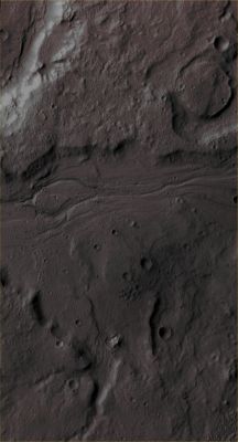 Features of Tempe Terra (Absolute Natural Colors; credits for the additional process. and color.: Dr Paolo C. Fienga/Lunar Explorer Italia/Italian Planetary Foundation)
In this VIS image, taken by the NASA - Mars Odyssey Orbiter on March, 5th, 2014, and during its 54.219th orbit around the Red Planet, we can see a small portion of the Eastern Margin of the Martian Region known as Tempe Terra, where numerous Unnamed Outflow Channels can be found. In this picture, if you look at it carefully, you will be able to see an interesting and unusually-looking Craters' Cluster (approx. 13 small Impact Craters, very close to one another and showing different levels of degradation, are visible - look at the lower Right - Dx - center of the frame) and a white-colored, medium-sized Outcrop (lower center of the frame), surrounded by small, low and curvilinear Ridges whose origin is (so far) unknown.

Latitude (centered): 35,3128° North 
Longitude (centered): 305,1220° East 
Instrument: VIS 

This image (which is a crop taken from an Original Mars Odyssey Orbiter b/w and Map-Projected frame published on the NASA - Planetary Photojournal with the ID n. PIA 18251) has been additionally processed, magnified to aid the visibility of the details, contrast enhanced, Gamma corrected and then colorized in Absolute Natural Colors (such as the colors that a human eye would actually perceive if someone were onboard the NASA - Mars Odyssey Orbiter and then looked down, towards the Surface of Mars), by using an original technique created - and, in time, dramatically improved - by the Lunar Explorer Italia Team.
Parole chiave: Mars from orbit - Channels - Unnamed Channel