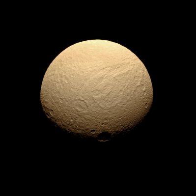 Tethys, in full light (natural colors; credits: Lunexit)
Caption NASA:"Five hours after acquiring PIA10460, the Cassini Spacecraft turned its cameras back to Tethys for a more southerly view. The southern reaches of Ithaca Chasma are seen here, along with the large crater Telemus, just right of center. 
Lit terrain seen here is on the Saturn-Facing Side of Tethys (approx. 1062 Km, or 660 miles across). 
This view looks toward the Southern Hemisphere from a perspective 43° South of the moon's Equator. North is toward the top and rotated 30° to the right. 

The image was taken in visible green light with the Cassini Spacecraft narrow-angle camera on July 28, 2008. The view was obtained at a distance of approx. 313.000 Km (such as about 194.000 miles) from Tethys and at a Sun-Tethys-Spacecraft, or Phase, Angle of 42°. 
Image scale is roughly 2 Km (a little more than 1 mile) per pixel".
Parole chiave: Saturn's Moon - Tethys
