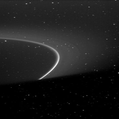 Aegaeon and the G-Ring
Caption NASA:"The bright arc within Saturn's G-Ring is shown truncated by the shadow of the Planet at the bottom of this image. 
Although it can't be seen here, the tiny moonlet Aegaeon (formerly known as S/2008 S 1) orbits within the bright arc. 
This view looks toward the northern, sunlit side of the Rings from about 4° above the Ring-Plane. Many background stars are visible elongated by the motion of the Spacecraft during the image's exposure. 

The image was taken in Visible Light with the Cassini Spacecraft narrow-angle camera on Oct. 9, 2009. The view was obtained at a distance of approx. 2,1 MKM (about 1,3 MMs) from Saturn. Image scale is roughly 12 Km (a little more than 7 miles) per pixel".
Parole chiave: Saturn's Rings - "G" Ring