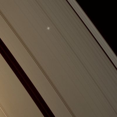 Antares, through the Rings (MULTISPECTRUM; credits: Lunexit)
Cpation NASA:"A point of light flickers behind Saturn's Rings as multiple instruments on the Cassini Spacecraft observe a stellar occultation of Antares (or alpha Scorpii). 
Such observations are designed to understand the fine-scale structure of the Rings. Scientists look at variations in the observed brightness of the star (whose actual brightness is well known) to determine the opacity of the Rings in different places. 
Among other things, Cassini's prior stellar occultations have been used to examine density and bending waves induced in the A-Ring by Saturn's various moons. 
This view looks toward the unilluminated side of the Rings from about 34° above the Ring-Plane. 

The image was taken in visible light with the Cassini spacecraft narrow-angle camera on Jan. 3, 2008. The view was obtained at a distance of approx. 541.000 Km (such as about 336.000 miles) from Saturn. 
Image scale is about 4 Km (a little less than 3 miles) per pixel".
Parole chiave: Saturn's Rings & Antares