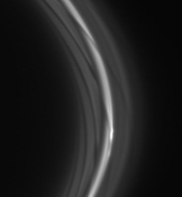 The strange appearence of the F-Ring
Caption NASA:"The striated appearance of the F-Ring is immediately apparent in the region of the ring that trails behind the moon Prometheus. The F-Ring is characterized here by dark gores that stretch inward toward the planet and forward in the direction of motion. 
This image has been expanded in the horizontal direction by a factor of 5 in order to make radial variations more prominent. 
The curvature of the Rings is also exaggerated by the horizontal stretch. 
The exterior flanking ringlets (to the right of the bright ring core) are not disturbed by Prometheus to the great degree seen in the inner ringlets. This view looks toward the unlit side of the Rings from about 31° above the Ring-Plane. 

The image was taken in visible light with the Cassini spacecraft narrow-angle camera on Nov. 25, 2006 at a distance of approx. 1,7 MKM (about 1,1 MMs) from Saturn and at a phase angle of 162°. Scale in the original image is roughly 10 km per pixel".
Parole chiave: Saturn's Rings - The "F" Ring