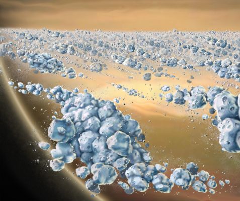 Icy Rings
Caption NASA:"This is an artist concept of a close-up view of Saturn's Ring particles. The planet Saturn is seen in the background (yellow and brown). 
The particles (blue) are composed mostly of ice, but are not uniform. They clump together to form elongated, curved aggregates, continually forming and dispersing. The space between the clumps is mostly empty. The largest individual particles shown are a few meters (yards) across". 
Parole chiave: Space Posters & Paintings