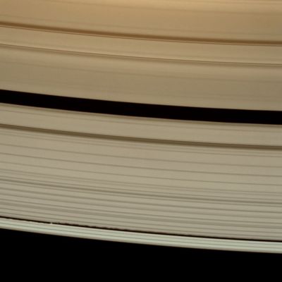 On the edge... (MULTISPECTRUM-2; credits: Lunexit)
Caption NASA:"This detailed look at Saturn's A-Ring captures Daphnis in the narrow Keeler Gap. The small moon creates complex wave patterns in the gap edges that Cassini scientists are working to understand. To the right of the Keeler Gap, the outer A-Ring edge is significantly brighter than the rest of the Ring. 
This view looks toward the unilluminated side of the Rings, from about 32° above the Ring-Plane. Daphnis is about 8 Km (approx. 5 miles) wide. 

The image was taken in visible light with the Cassini Spacecraft narrow-angle camera on May 31, 2008. The view was acquired at a distance of approx. 1 MKM (about 629.000 miles) from Saturn. 
Image scale is roughly 6 Km (about 4 miles) per pixel".
Parole chiave: Saturn's Rings - The A-Ring