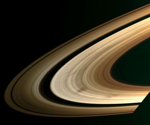 Spooky Spokes! (MULTISPECTRUM; credits: Lunexit)
Caption NASA:"As they wheel about the Planet, Saturn's sunlit Rings often exhibit dark, radial markings called "spokes". Spokes are seen only in the broad B-Ring, and can also appear bright in certain viewing geometries. 
This view looks toward the sunlit side of the Rings from about 11° below the Ring-Plane. 
Pandora (about 81 kilometers, or approx. 50 miles across) is a speck above the Rings at left. The Planet's shadow darkens the Ring-Plane at lower right. 

The image was taken in visible light with the Cassini Spacecraft wide-angle camera on June 3, 2008. The view was acquired at a distance of approx. 1 MKM (about 636.000 miles) from Saturn and at a Sun-Saturn-Spacecraft, or Phase, Angle of 19°. 
Image scale is roughly 61 Km (approx. 38 miles) per pixel".
Parole chiave: Saturn's Rings - Spokes