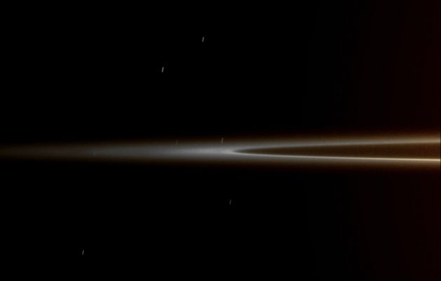 Faint Ring Arcs in the G-Ring (possible True Colors; credits: Lunar Explorer Italia)
Caption NASA:"This low elevation image shows the G-Ring Arc recently discovered by Cassini. This faint arc of material is maintained by a gravitational interaction with the moon Mimas. 

The image was taken in Visible Light with the Cassini Spacecraft narrow-angle camera on Oct. 20, 2008 at a distance of approx. 1,2 MKM (about 736.000 miles) from Saturn and at a Sun-Saturn-Spacecraft angle of 23°. Image scale is roughly 7 Km (such as about 4 miles) per pixel".

Nota Lunexit: il chiarore che si percepisce sulla Sx del frame è un effetto dovuto alla luce intensa che proviene da Saturno stesso (per riprendere con simile dettaglio il debole Anello "G", infatti, l'obiettivo di Cassini è - molto probabilmente - stato tenuto aperto per un tempo superiore ai 10 secondi, così leggermente sovraesponendo il frame sul suo lato più prossimo a Saturno; un altro elemento che ci permette di dire che la "posa" è stata pari o superiore alla decina di secondi la potete trovare nelle numerose "star-trails", che costellano il cielo intorno all'Anello "G").
Parole chiave: Saturn's Rings - The "G-Ring"