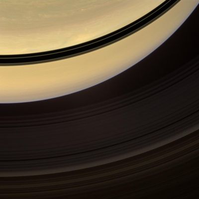 The Rings of Saturn (Natural Colors; credits: NASA/JPL/Space Science Institute)
Caption NASA:"Shadows cast onto Saturn by its Rings, visible here as dark bands, move steadily towards the Equator and grow thinner as Equinox approaches. 
The Sun will cross Saturn's Ring-Plane on Aug. 10, 2009. Color variations between clouds in the Northern Hemisphere are more apparent than those in the Southern Hemisphere, which seems relatively bland, as Spring arrives in the North and Fall in the South. 

Images taken using red, green and blue spectral filters were combined to create this natural color view. The images were acquired with the Cassini spacecraft wide-angle camera on Nov. 22, 2008 at a distance of approx. 859.000 Km (about 533.000 miles) from Saturn and at a Phase Angle of 56°. 
Image scale is roughly 48 Km (about 30 miles) per pixel".
Parole chiave: Saturn's Rings