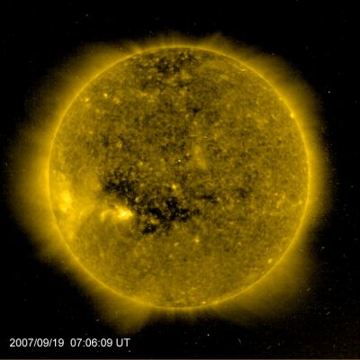 Coronal Hole
Caption NASA:"The dark expanse below the Equator of the Sun is a Coronal Hole, such as a Low Density Region extending above the surface, where the Solar Magnetic Field opens freely into interplanetary space. 
Shown in false color, the picture was recorded on September 19th, 2007, in Extreme Ultraviolet Light by the EIT instrument onboard the space-based SOHO observatory. Studied extensively from space since the 1960s in ultraviolet and x-ray light, Coronal Holes are known to be the source of the high-speed Solar Wind, atoms and electrons that flow outward along the open magnetic field lines. 
The Solar Wind streaming from this coronal hole triggered colorful auroral displays on planet Earth begining late last week, enjoyed by spaceweather watchers at high latitudes".
Parole chiave: The Sun from Space