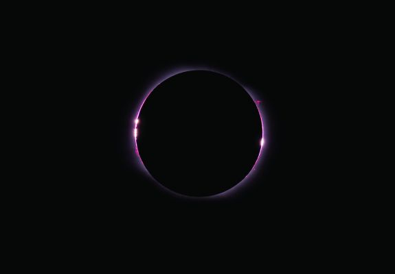 At the Sun's Edge
Caption NASA:"A train trip on the Trans-Siberian railway to Novosibirsk resulted in this stunning view along the edge of the Sun, recorded during the August 1st, 2008, total Solar Eclipse. 
The picture is a composite of two images taken at special moments in the eclipse sequence, corresponding to the very beginning and the very end of the total eclipse phase. 
Those times are known to eclipse chasers as 2nd and 3rd contact. 

Bright beads around the Moon's dark silhouette are rays of sunlight shining through lunar valleys at the edge of the Lunar Disk. 

But the composite view also captures Solar Prominences, such as "looping structures" of hot plasma suspended in magnetic fields, extending beyond the Sun's edge".
Parole chiave: From Earth Pictures - Professional Pictures